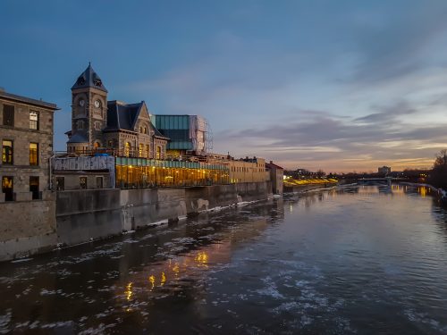 Two sides of the river around sunset